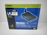 Linksys WET54G 2.4GHZ 802.11G Wireless Ethernet Bridge Mbps New Sealed. Fixed Price $23.69.