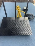 Asus RT-AC1750 Dual Band 3X3 802.11AC Wifi 4-PORT Wireless Gigabit Router. Fixed Price $25.75.