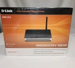 D-link Model WBR-2310 Range Booster Wireless Router New Factory Sealed. Fixed Price $29.99.